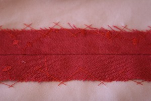 I catchstitched the seam allowances to the underlining so they stay pressed open after cleaning.